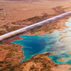 Futuristische Stadt "The Line" in Saudi-Arabien NEOM, die sich durch eine trockene Wüstenlandschaft schlängelt und an türkisfarbenes Wasser grenzt.