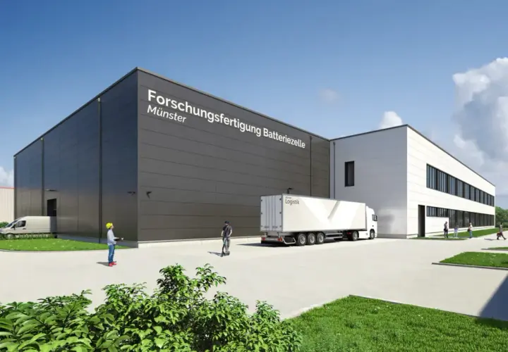 Moderne Gebäude des Fraunhofer FFB in Münster, mit LKW und Personen.