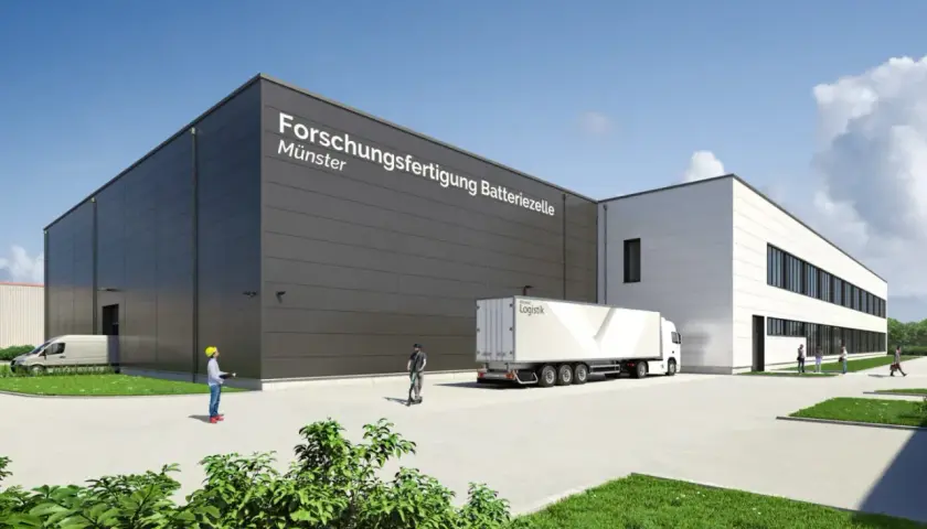 Moderne Gebäude des Fraunhofer FFB in Münster, mit LKW und Personen.