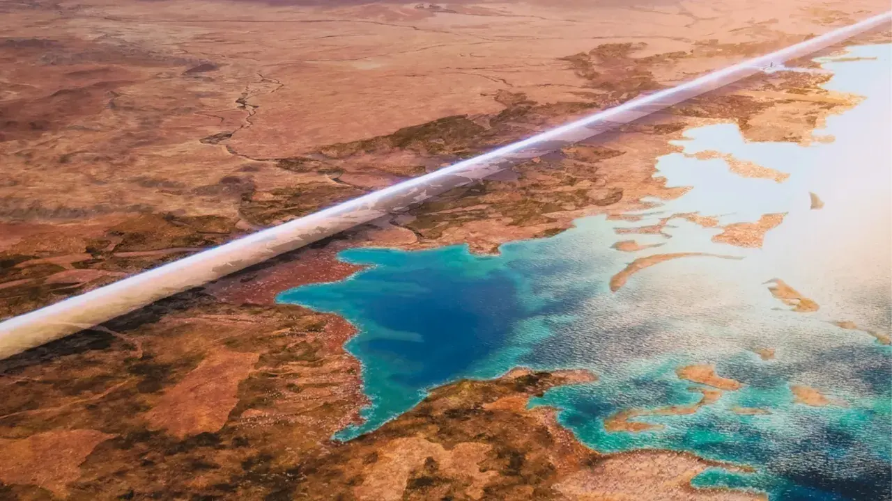 Futuristische Stadt "The Line" in Saudi-Arabien NEOM, die sich durch eine trockene Wüstenlandschaft schlängelt und an türkisfarbenes Wasser grenzt.